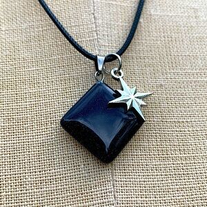 Handmade Shimmer Stone Amulet with Sun Charm
